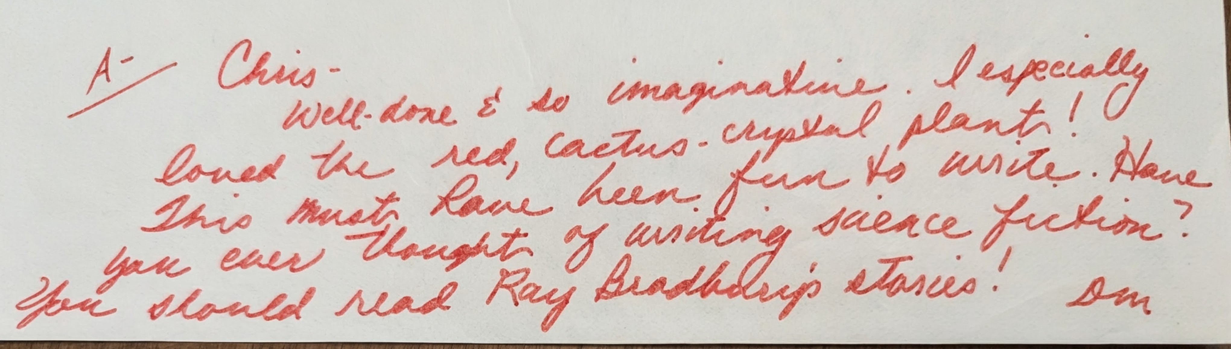 A 1983 handwritten note from Christopher's university composition instructor, encouraging him to keep writing